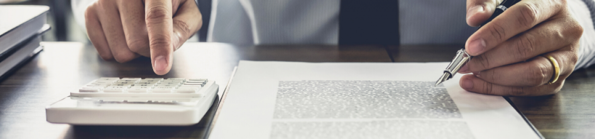 Page header image of office worker with calculator
